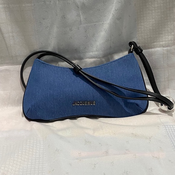 Jacquemus Blue Denim Handbag Features A Distinctive Curved Shape. - Picture 1 of 5